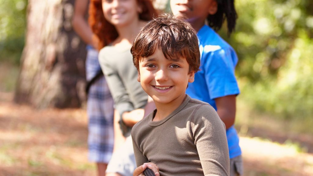 Children playing tug-of-war outside
