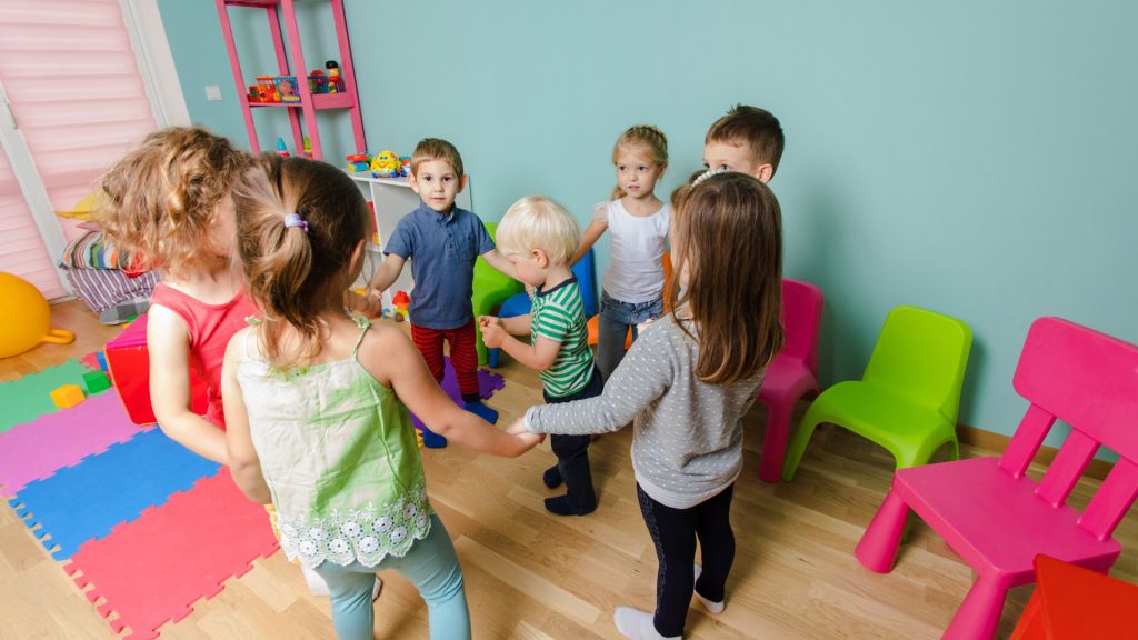 Children playing in a colorful room